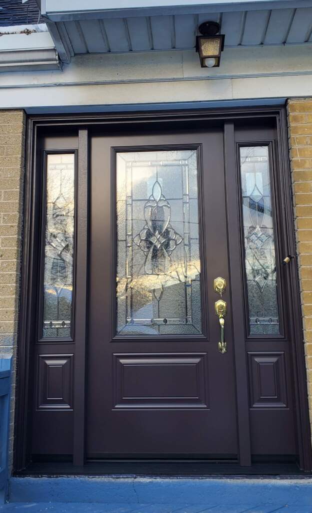 Steel front door with decorative glass for a Calgary home