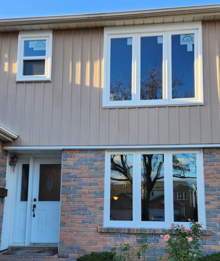 White vinyl replacement window selected for a Langdon home